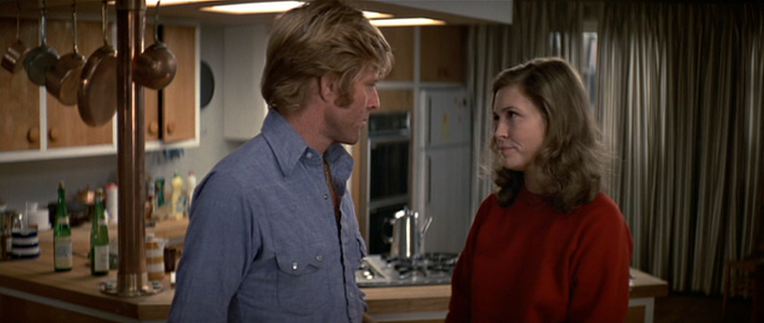 Robert Redford and Faye Dunaway as Joe and Kathy
