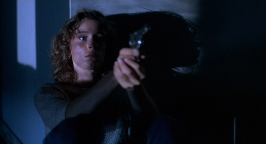 Frances McDormand as Abby, Pointing a Gun at Her Assailant