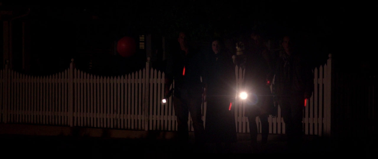 The Group From The Other House Have Red Glow Sticks