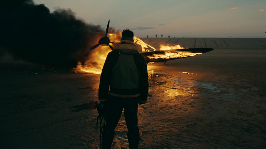 Tom Hardy as Farrier Watching his Downed Plane Burn