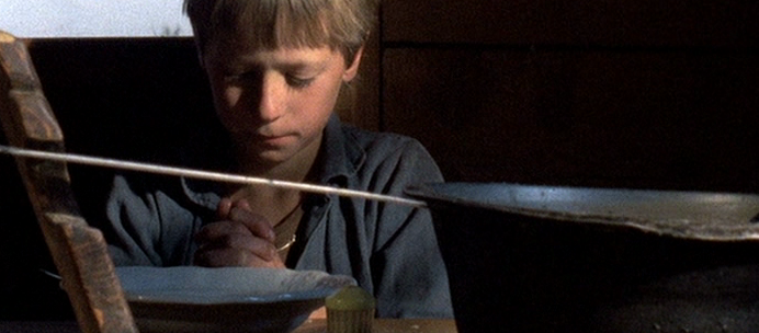 A Nice Shot Composition of Stefan Praying Before Dinner