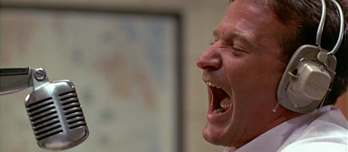 Robin Williams Yelling into the Microphone