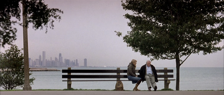 Catherine and Robert Sit on a Bench Together