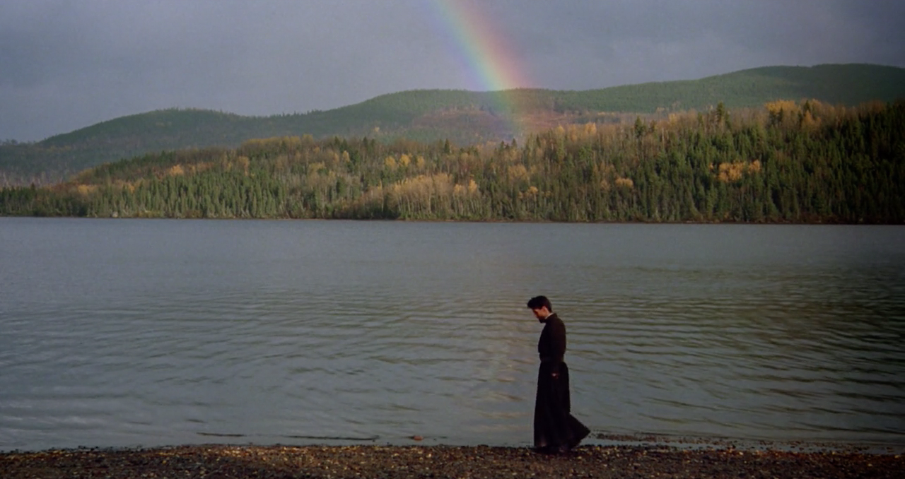 Father LaForgue Walks Along the Water