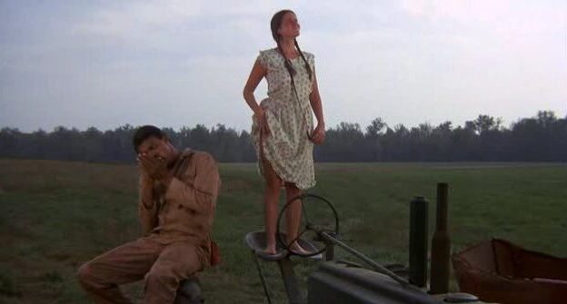 Barbara Hershey Standing on a Tractor