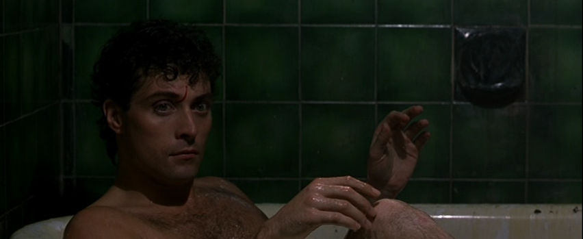Rufus Sewell as John Murdoch in a Bathtub