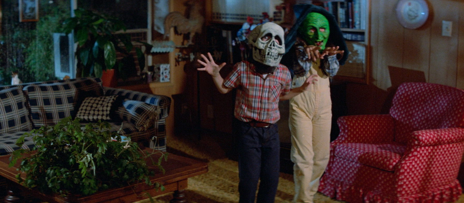 Dr. Challis's Children Wearing Their Halloween Masks