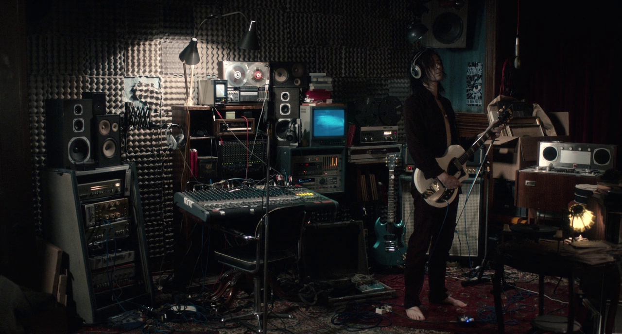 Adam Rocks Out in His Apartment Studio