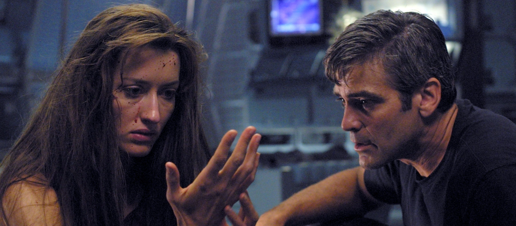 George Clooney as Dr. Chris Kelvin and Natascha McElhone as Rheya