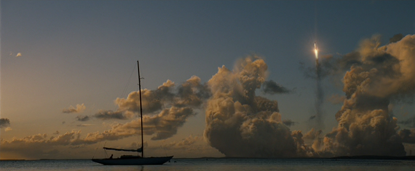 Benjamin and Daisy Watch a Rocket Launch from Their Sailboat