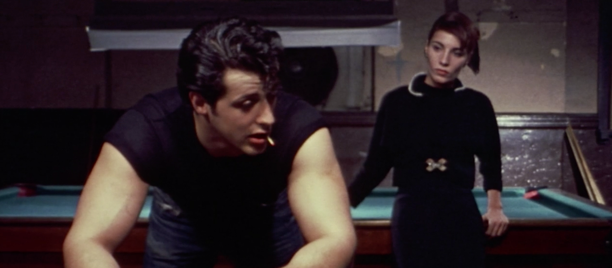 Sylvester Stallone as Stanely and Maria Smith as Frannie