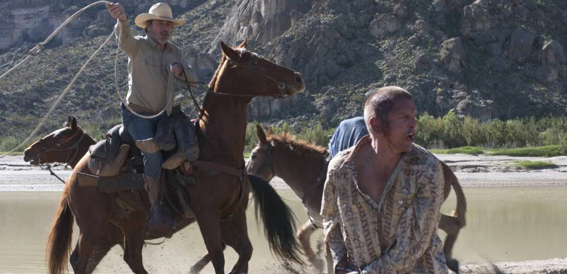 Pete Lassoing Mike from Horseback