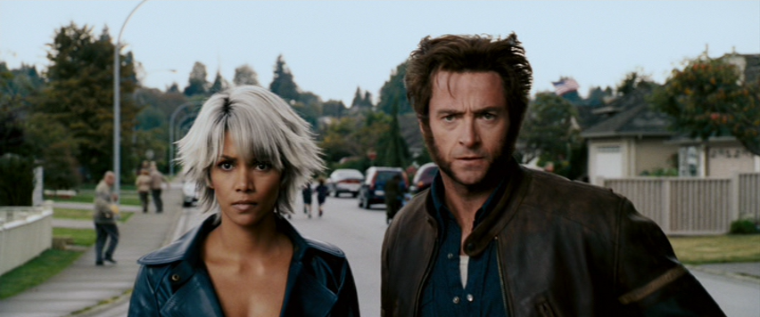 Hugh Jackman as Wolverine and Halle Berry as Storm